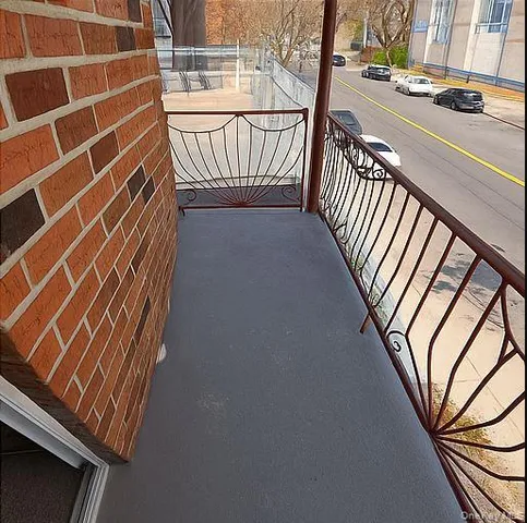 a view of stairs and wooden floor