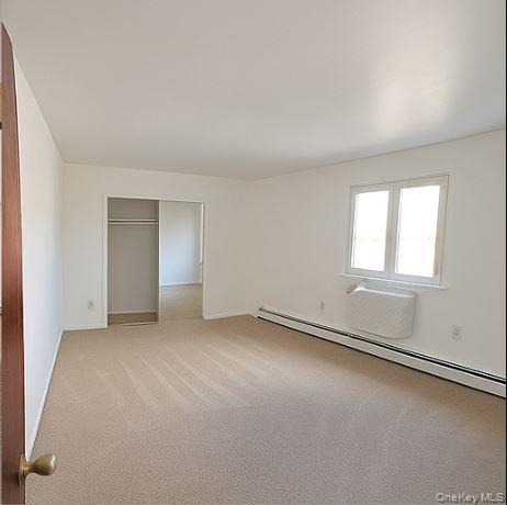 2460 Batchelder Street, Unit 2 Brooklyn, NY 11235 - Photo 5 of 14 an empty room with a window