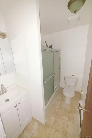 a bathroom with a sink and toilet