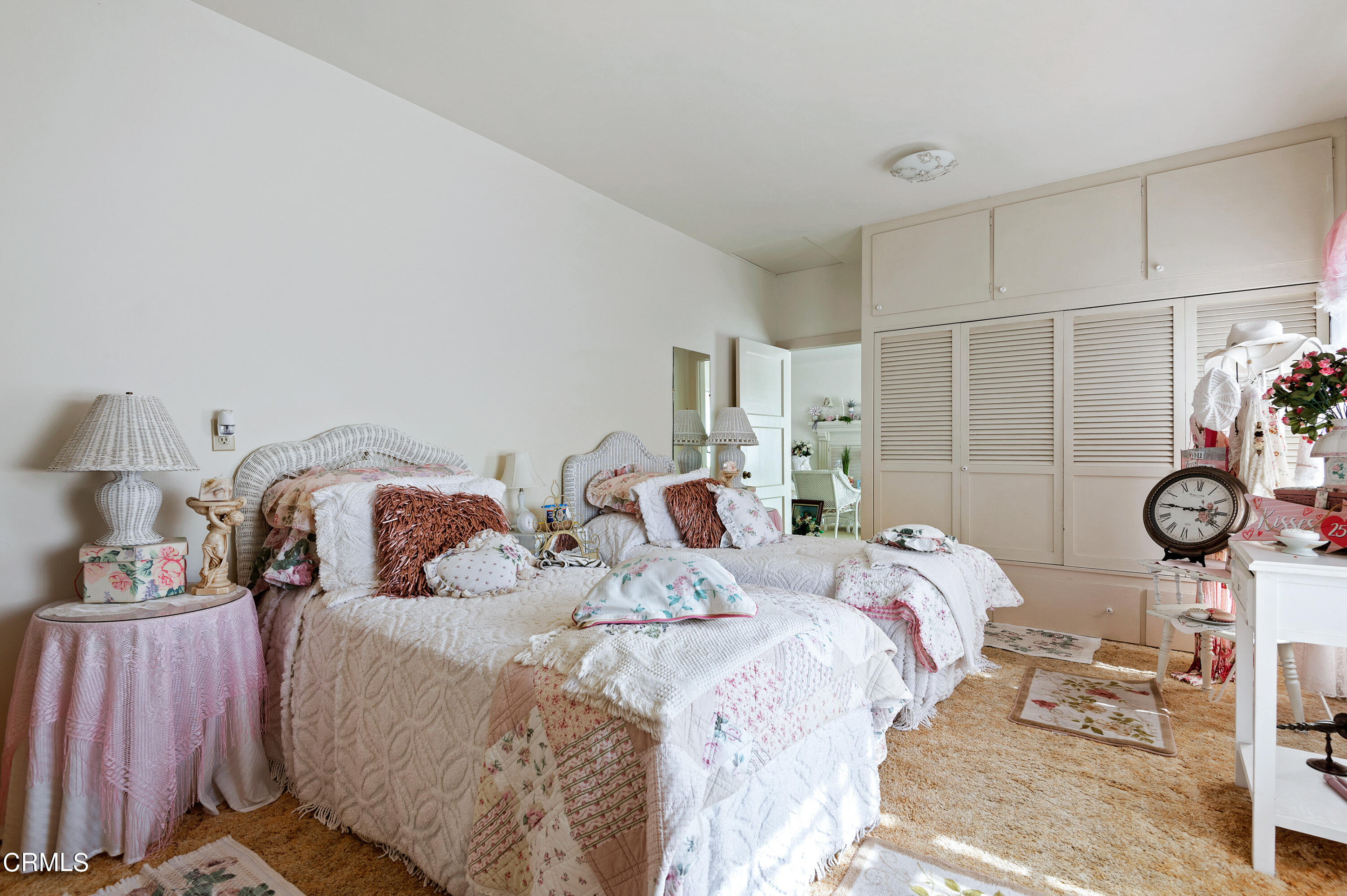 1602 Teal Club Road Oxnard, CA 93030 - Photo 13 of 30 a bedroom with two beds and a lamp on the dresser