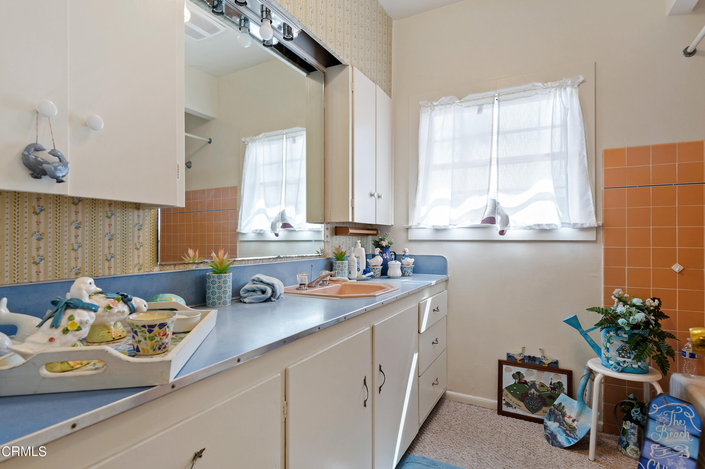 1602 Teal Club Road Oxnard, CA 93030 - Photo 15 of 30 a kitchen with sink refrigerator and window