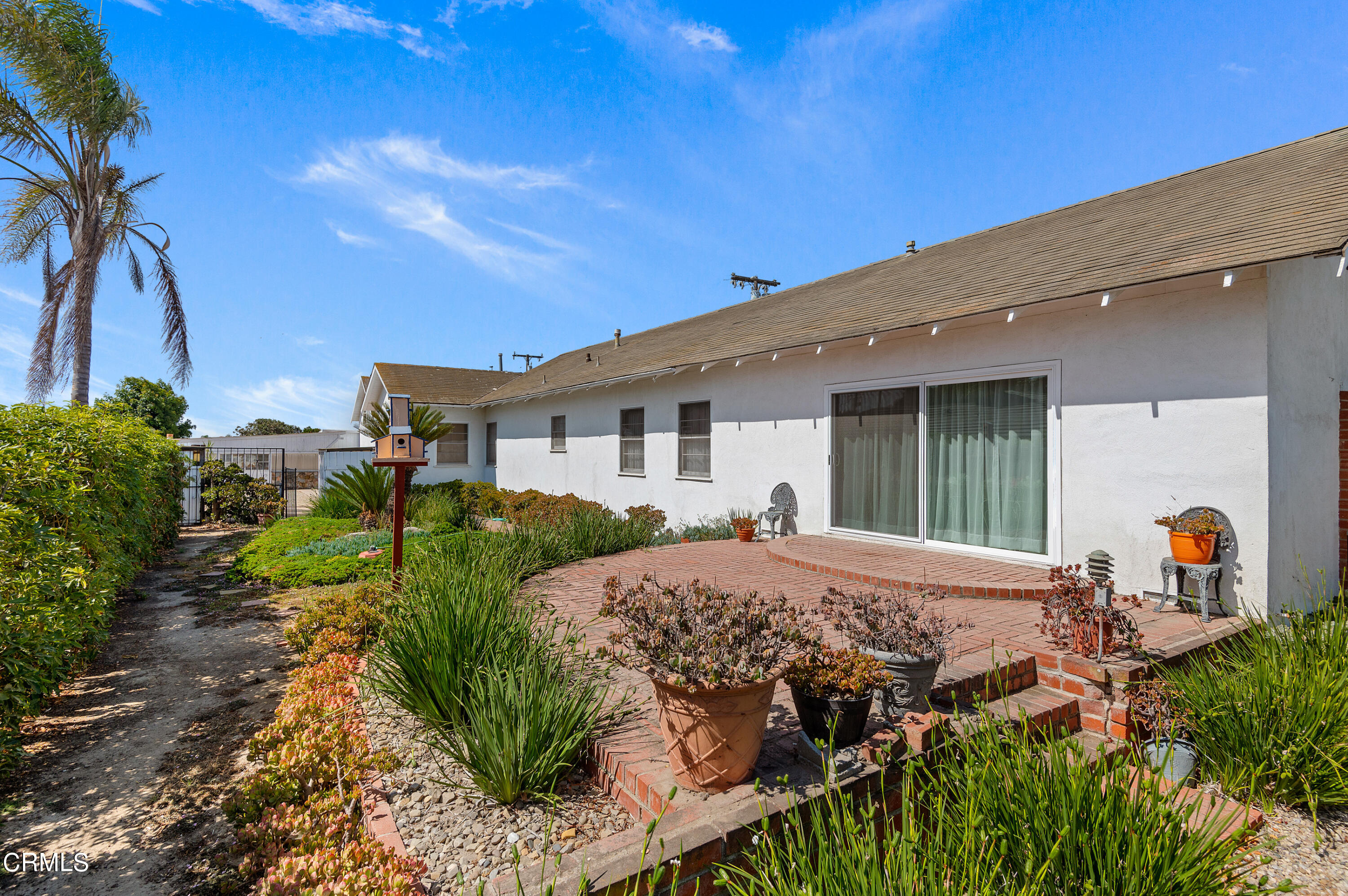 1602 Teal Club Road Oxnard, CA 93030 - Photo 25 of 30 a view of a house with backyard and sitting area