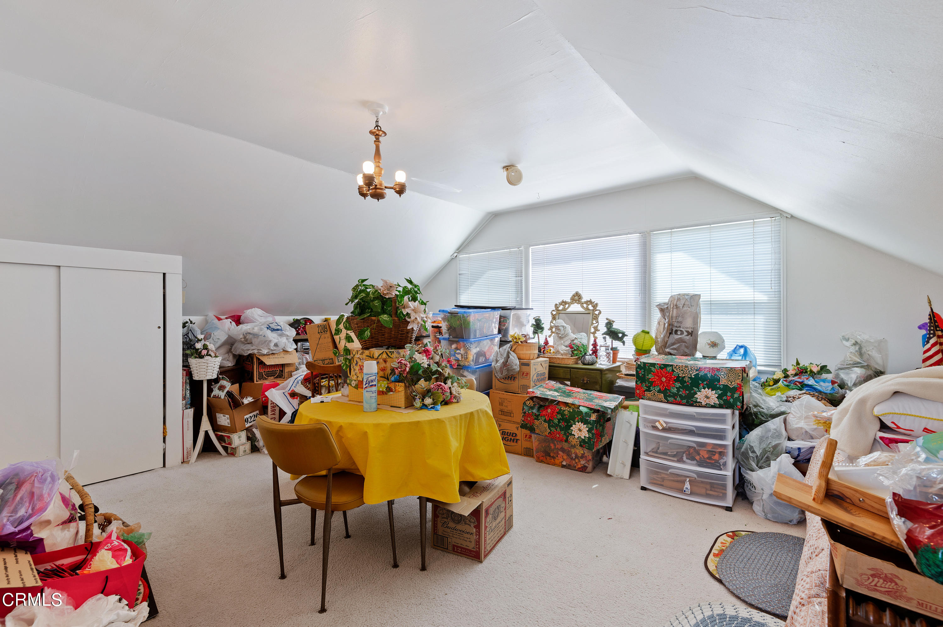 1602 Teal Club Road Oxnard, CA 93030 - Photo 27 of 30 a view of a dining room with furniture and a chandelier