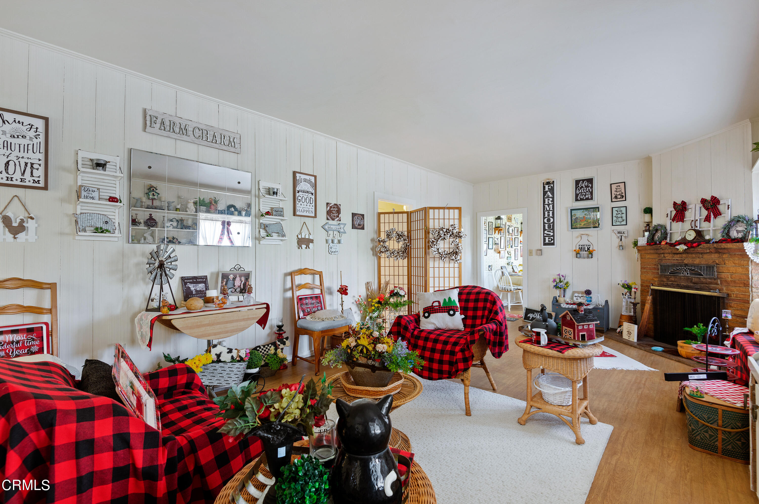 1602 Teal Club Road Oxnard, CA 93030 - Photo 7 of 30 a living room with lots of furniture and clutter