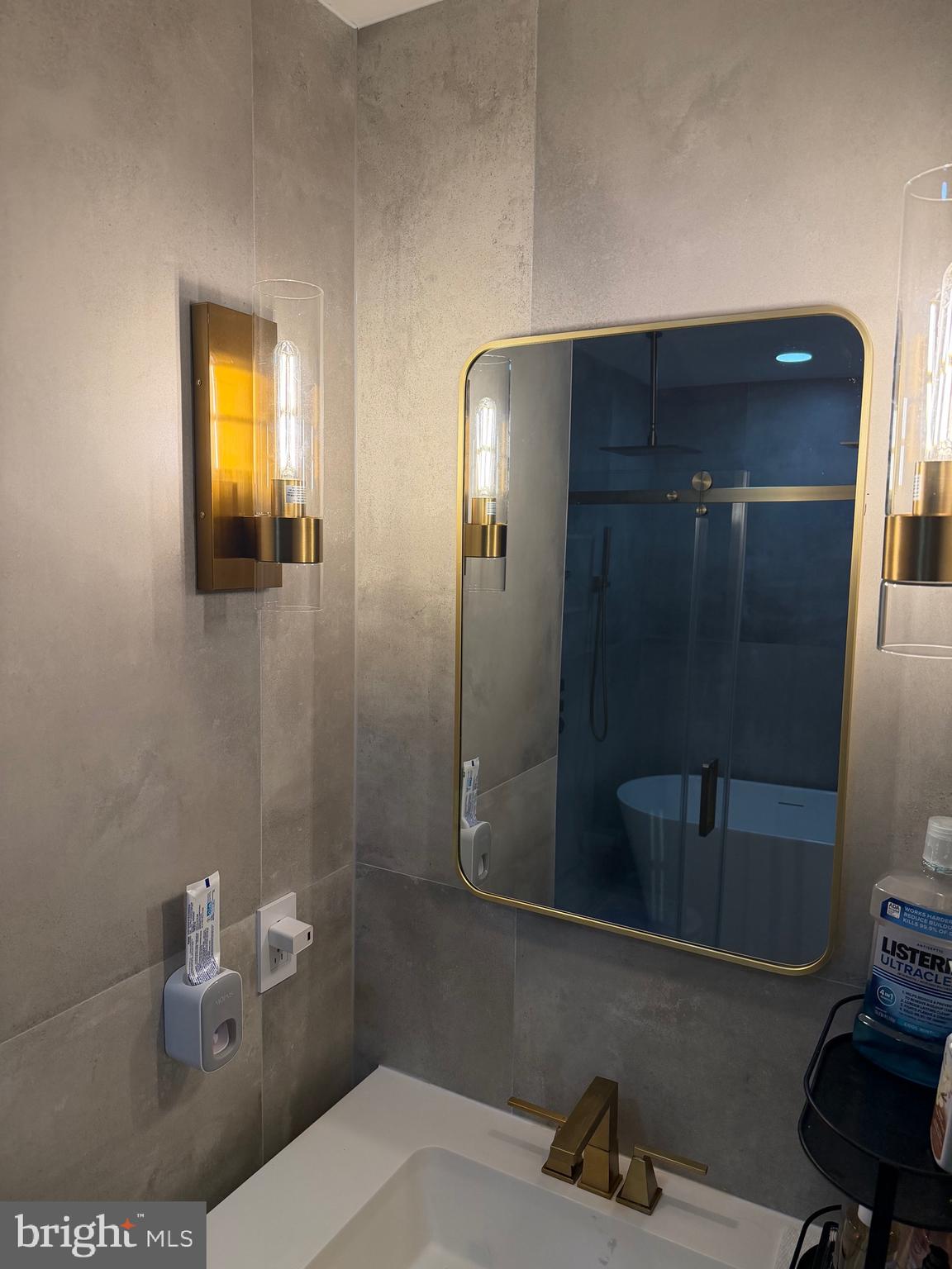 1801 Egg Harbor Road, Unit 712 Clementon, NJ 08021 - Photo 19 of 35 a bathroom with a sink and mirror