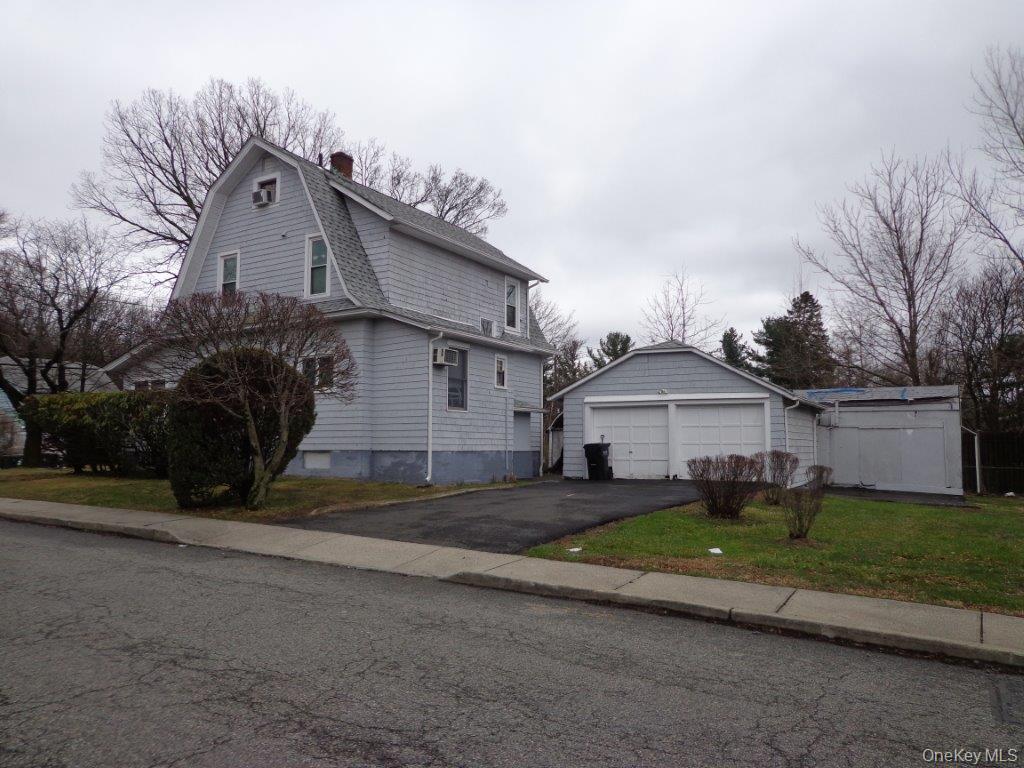 208 Saddle River Road Monsey, NY 10952 - Photo 1 of 4 a view of a house with a big yard plants and large trees