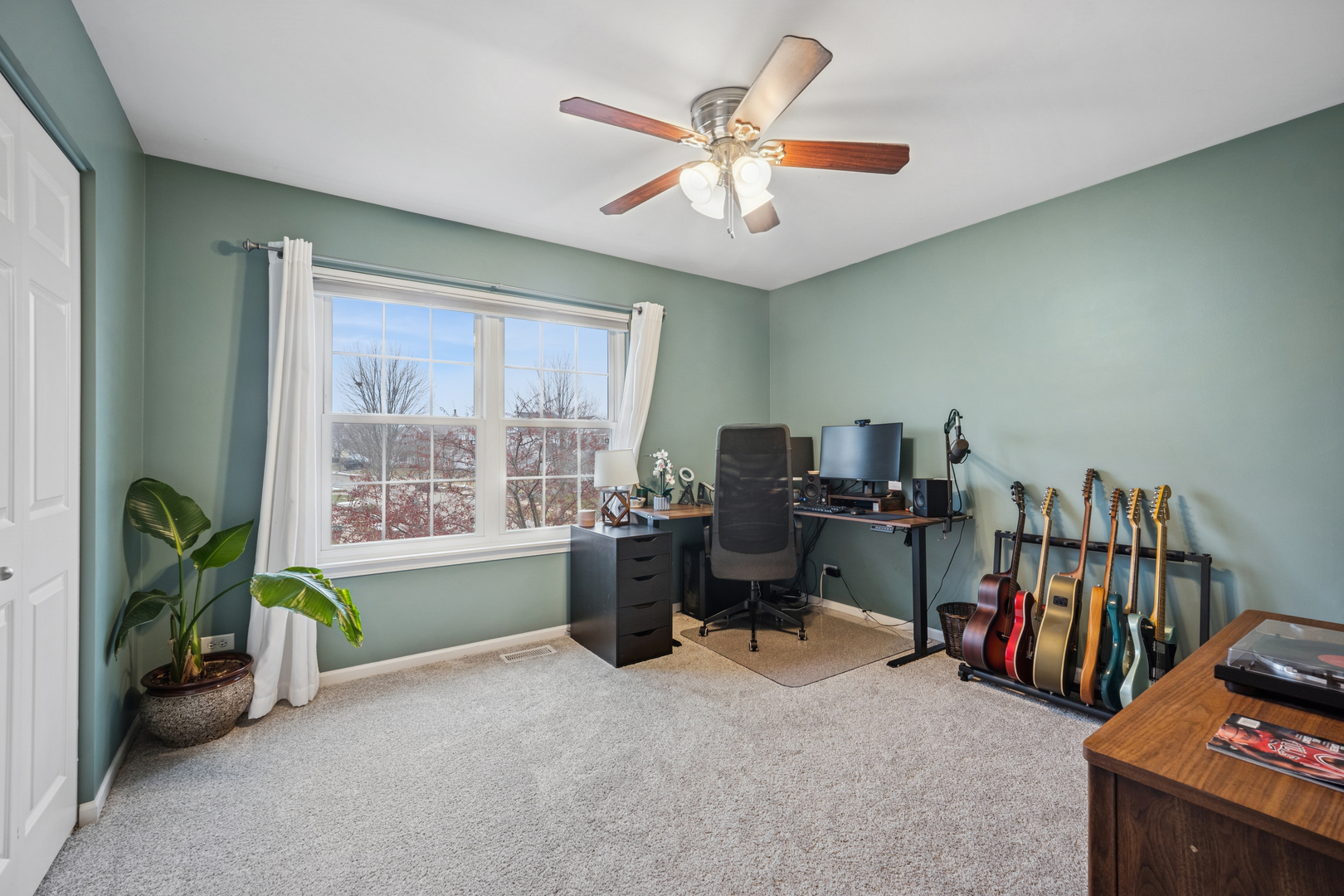 359 Copper Springs Lane Elgin, IL 60124 - Photo 15 of 23 a view of a workspace with furniture and a window