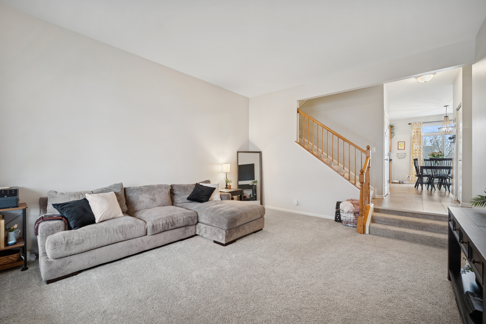 359 Copper Springs Lane Elgin, IL 60124 - Photo 2 of 23 a living room with furniture and stairs