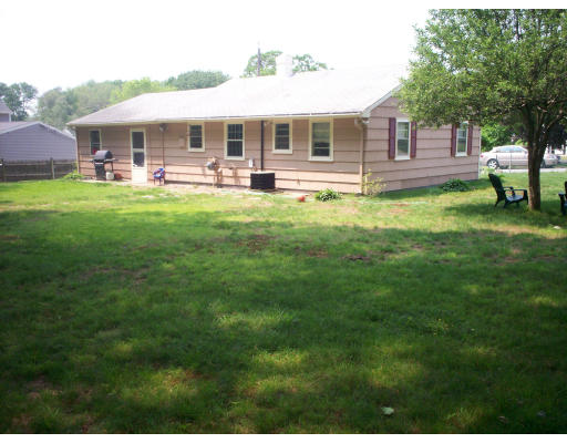 20 Elizabeth Road Billerica, MA 01821 - Photo 3 of 11 a front view of house with yard and outdoor seating