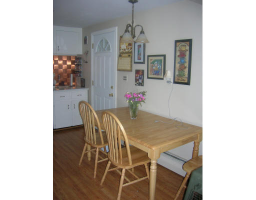 20 Elizabeth Road Billerica, MA 01821 - Photo 8 of 11 a view of a dining room with furniture and window