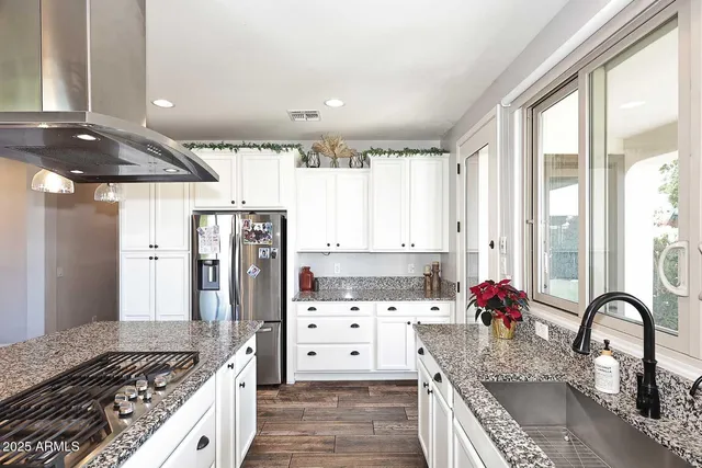 a view of swimming pool with a yard