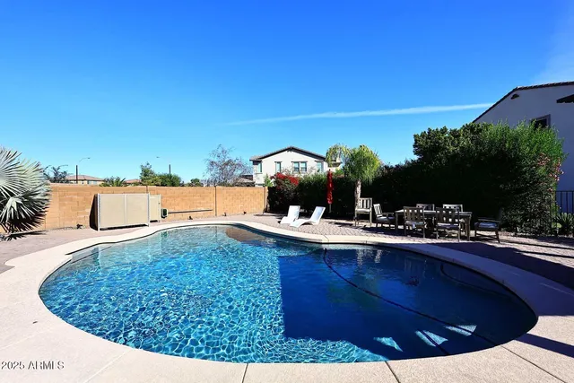 a view of entryway with stairs and front door