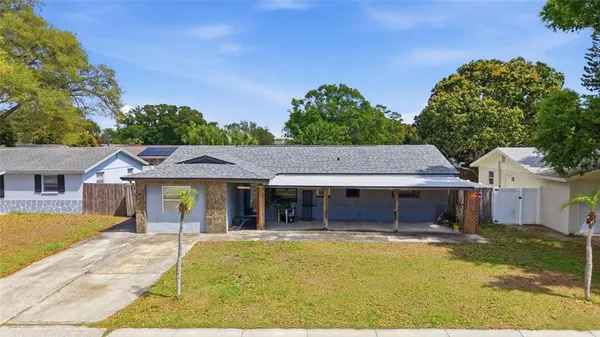 a view of a house with a swimming pool