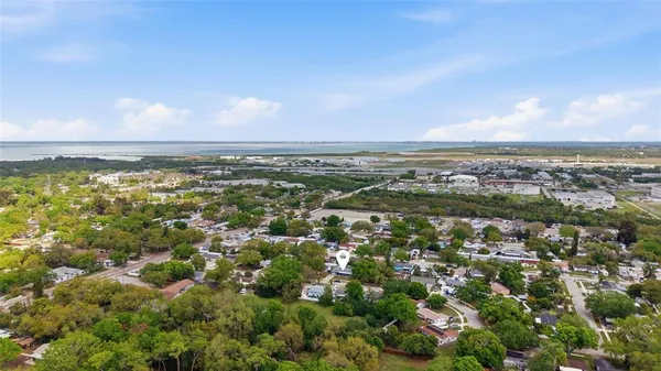 an aerial view of residential building and green space