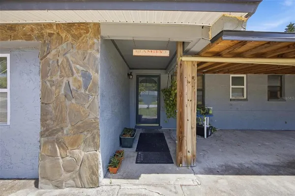 a view of a entryway door front of house