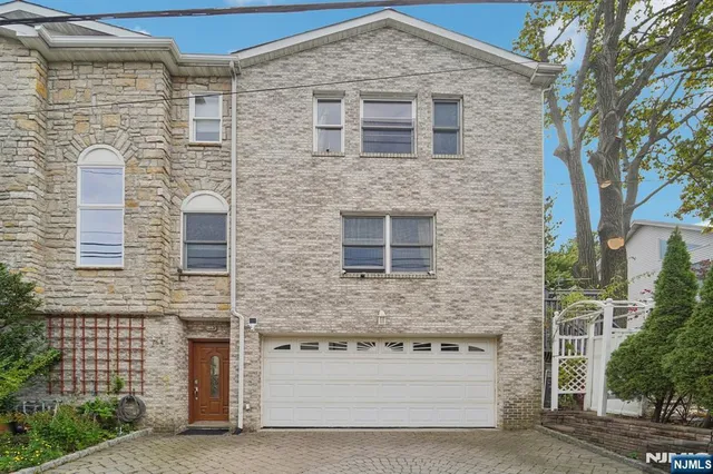 a building view with a brick wall