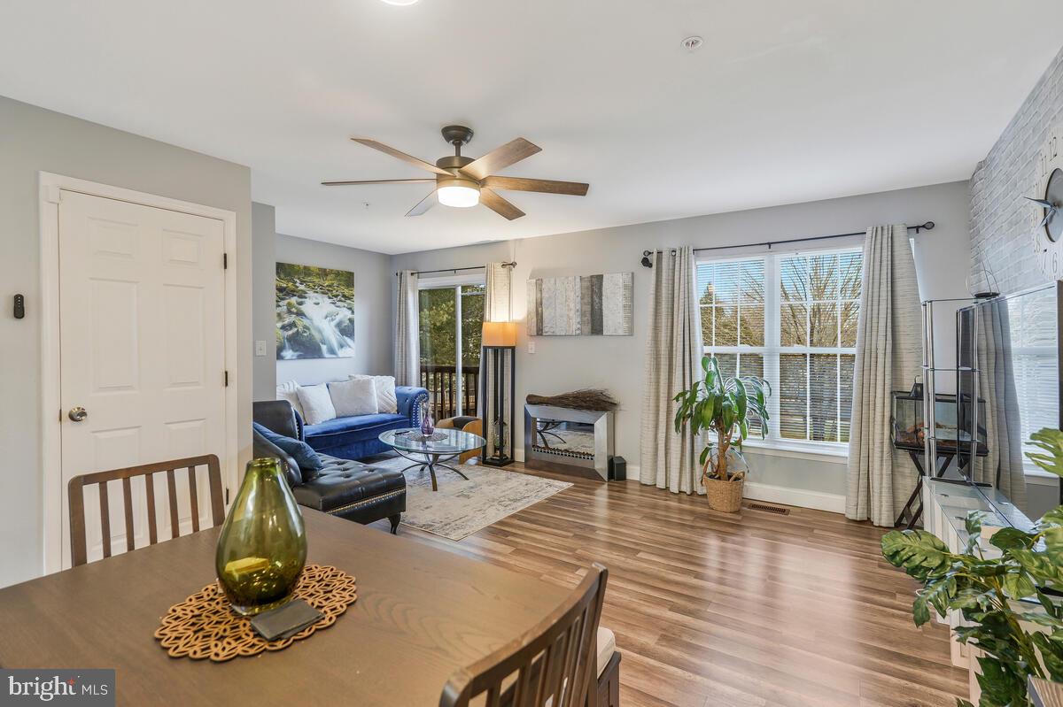 13111 Ripon Place Upper Marlboro, MD 20772 - Photo 12 of 32 a living room with fireplace furniture and a wooden floor