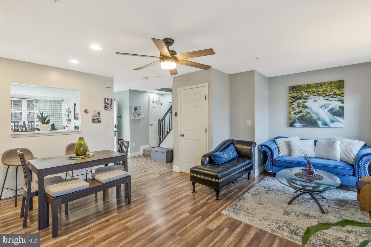 13111 Ripon Place Upper Marlboro, MD 20772 - Photo 14 of 32 a living room with furniture a rug and a window