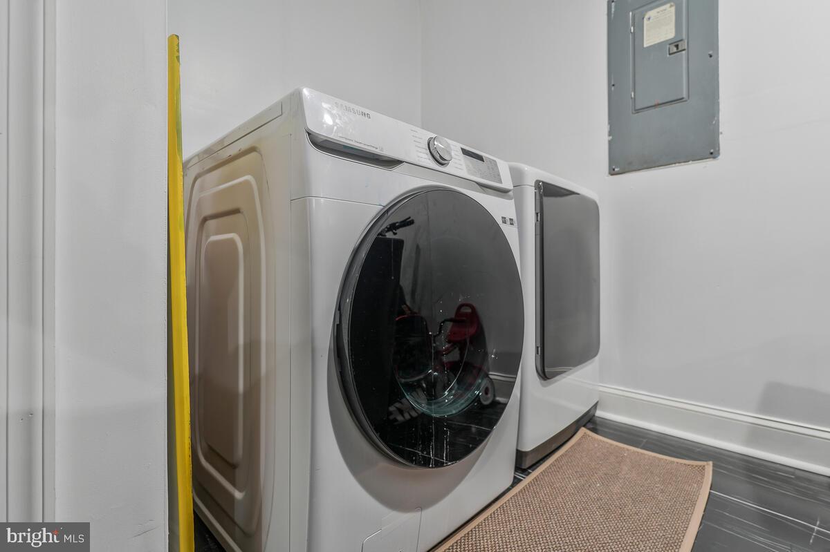 13111 Ripon Place Upper Marlboro, MD 20772 - Photo 27 of 32 a utility room with dryer and washer