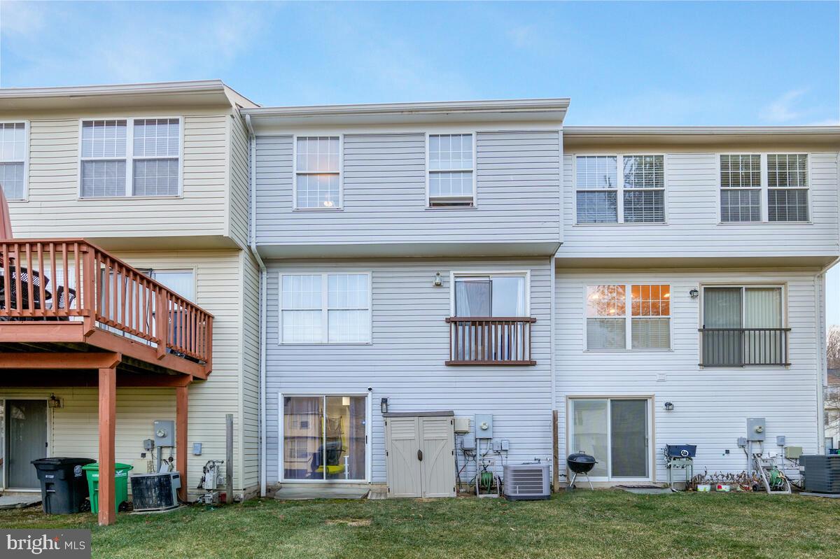 13111 Ripon Place Upper Marlboro, MD 20772 - Photo 28 of 32 a front view of a building with a garden