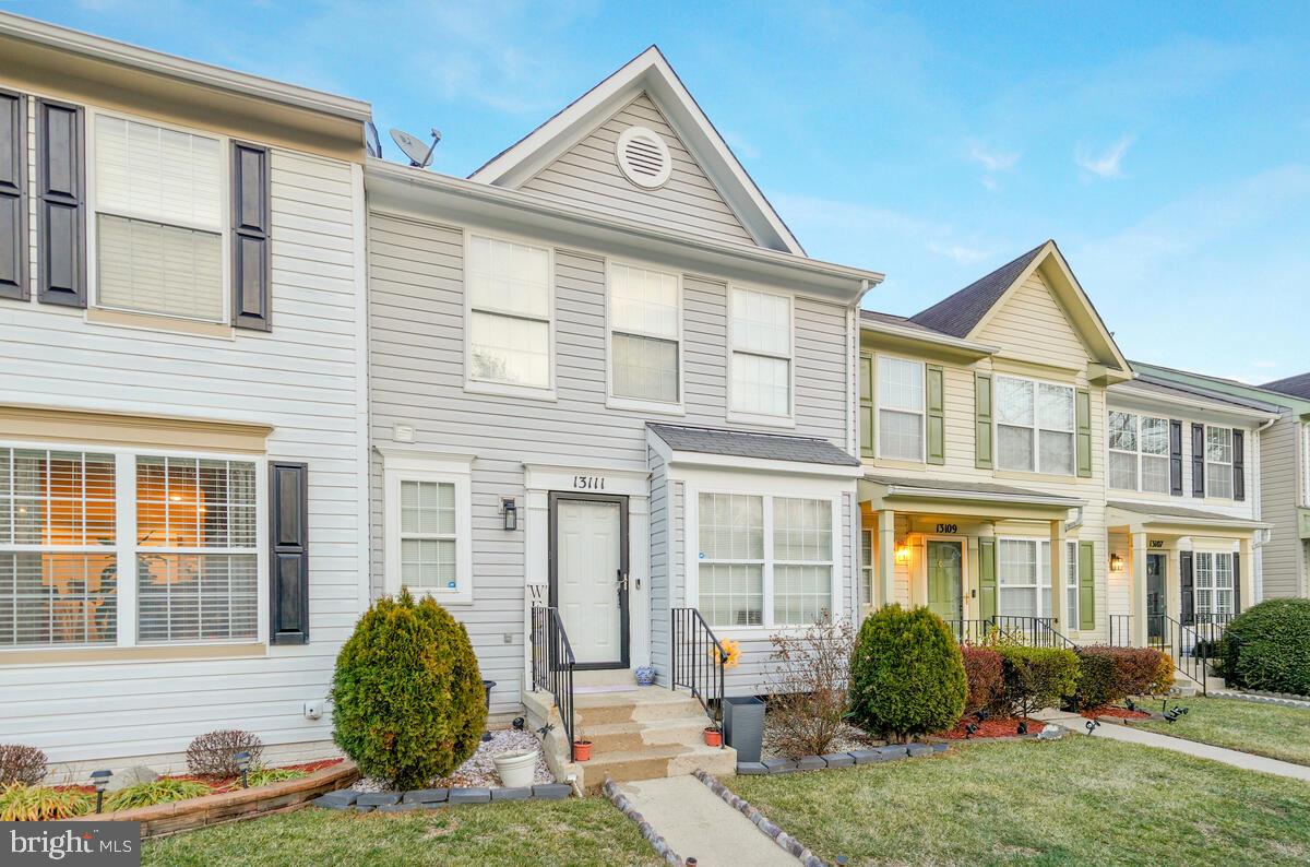 13111 Ripon Place Upper Marlboro, MD 20772 - Photo 3 of 32 a front view of a house with a yard