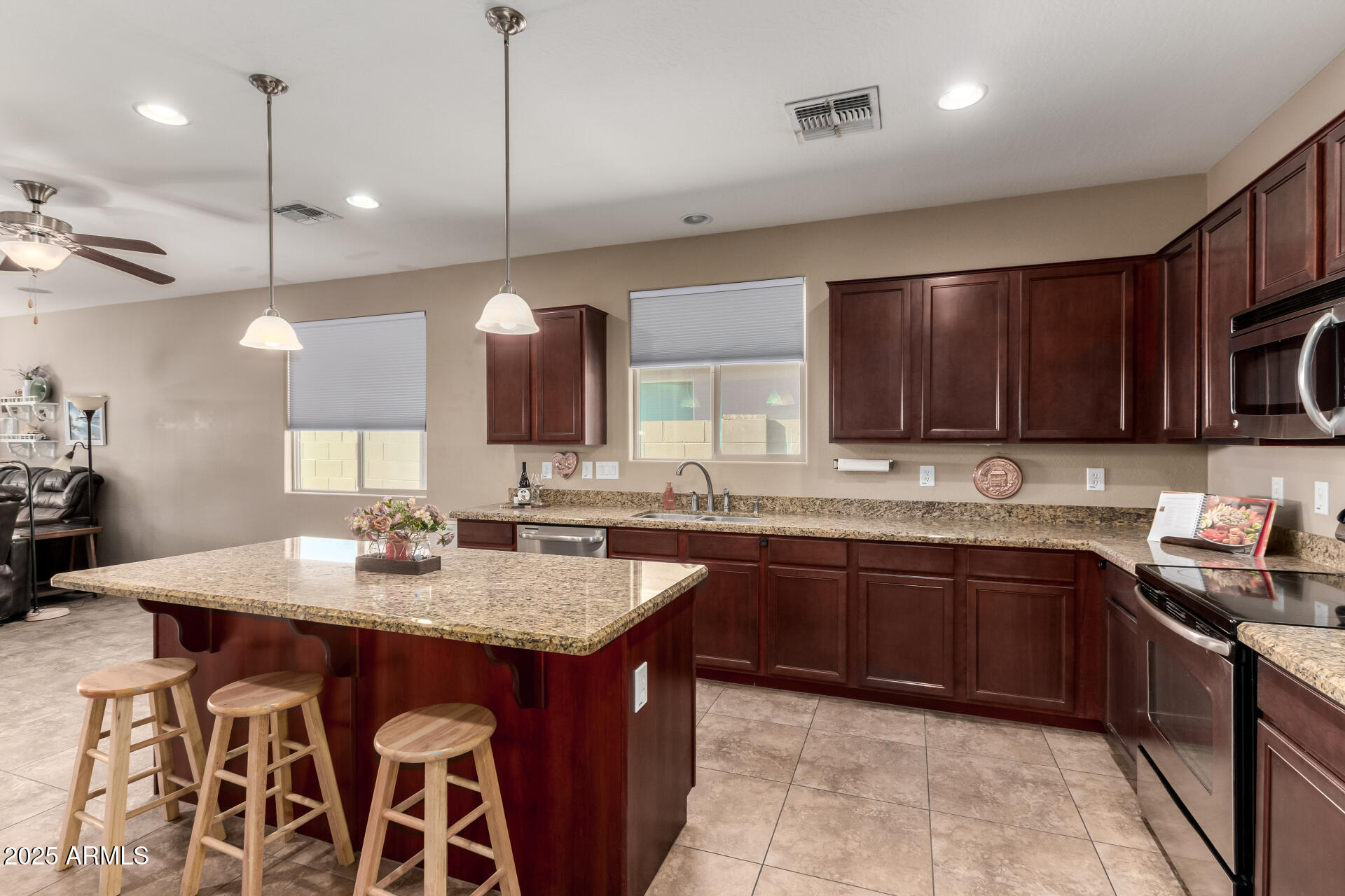 16093 West Almeria Road Goodyear, AZ 85395 - Photo 12 of 38 spacious Island