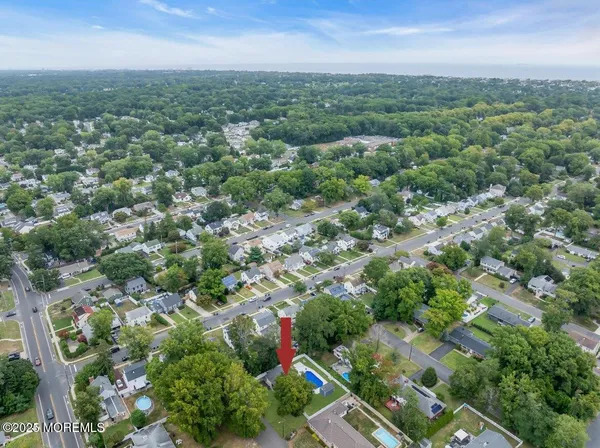 an aerial view of a city with lots of residential buildings