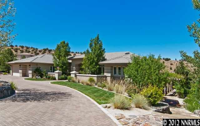 4415 Sharps Road Reno, NV 89519 - Photo 1 of 1 a front view of a house with a yard
