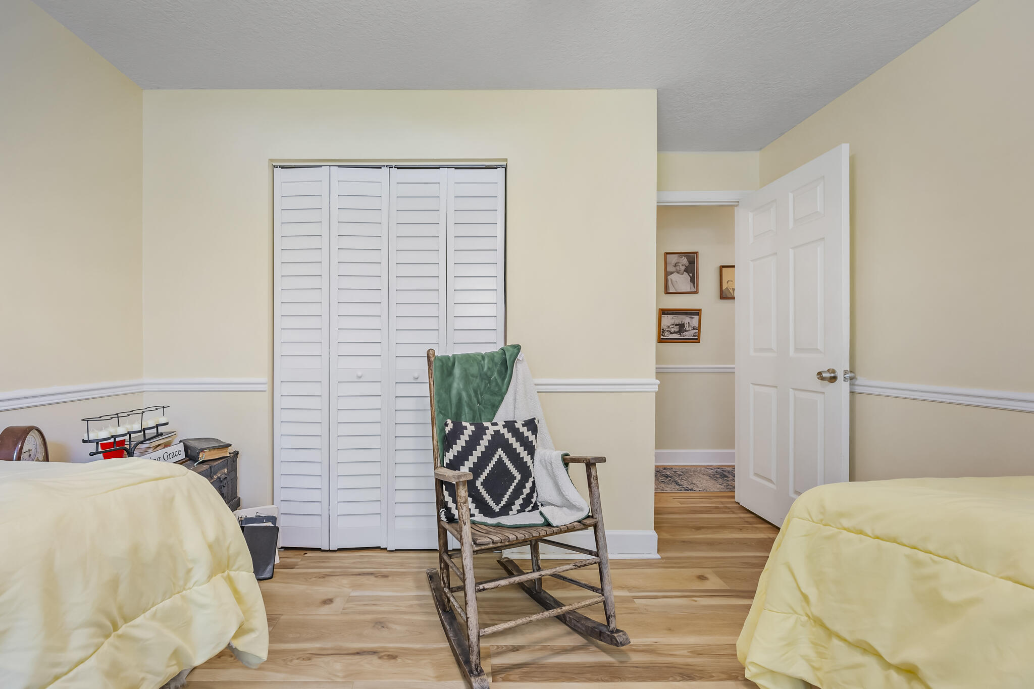 4650 Lake Washington Road Melbourne, FL 32934 - Photo 23 of 46 a bedroom with a bed and a table in it