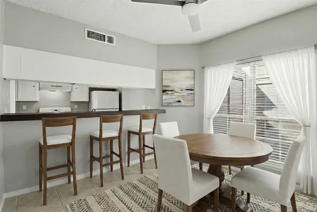 a view of a dining room with furniture