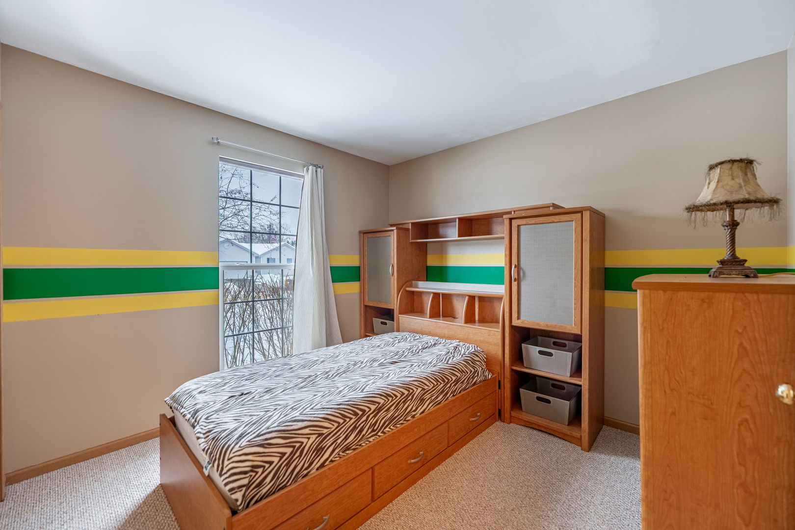 109 Shawnee Lane Harvard, IL 60033 - Photo 16 of 34 a bedroom with a bed table and a large window