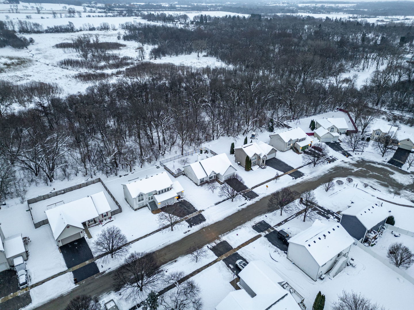 109 Shawnee Lane Harvard, IL 60033 - Photo 28 of 34 a picture of city view with lots of trees