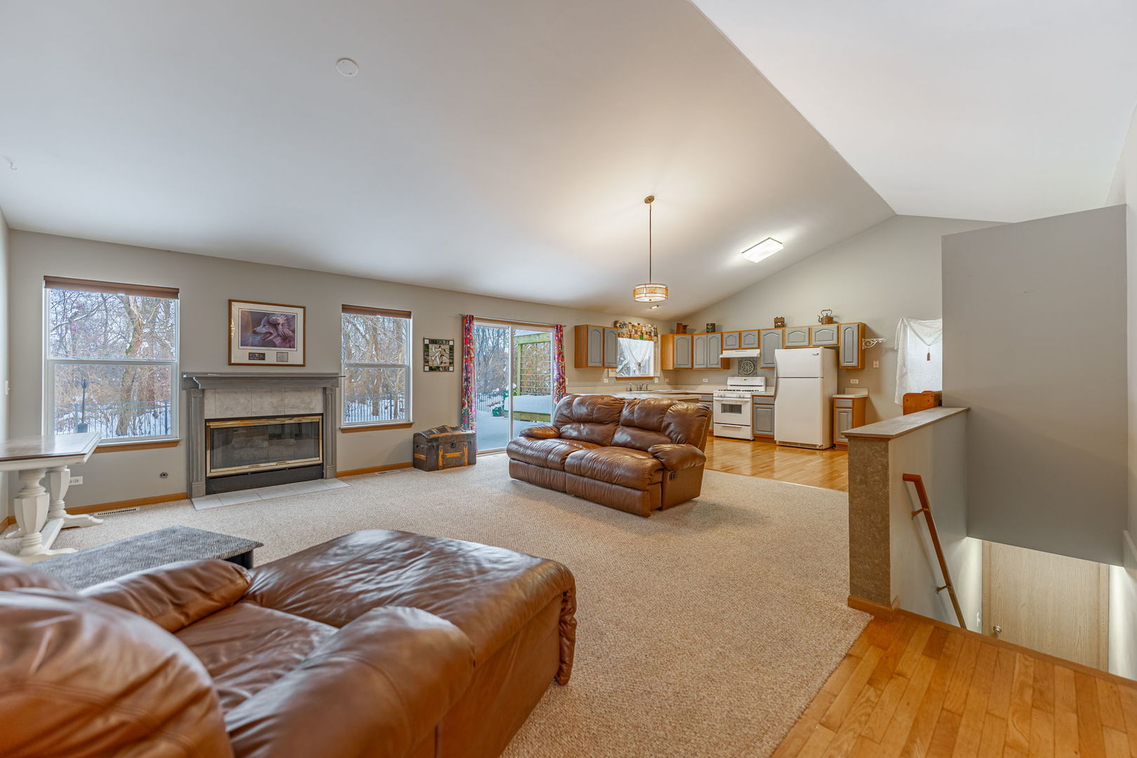 109 Shawnee Lane Harvard, IL 60033 - Photo 4 of 34 a living room with furniture and a wooden floor