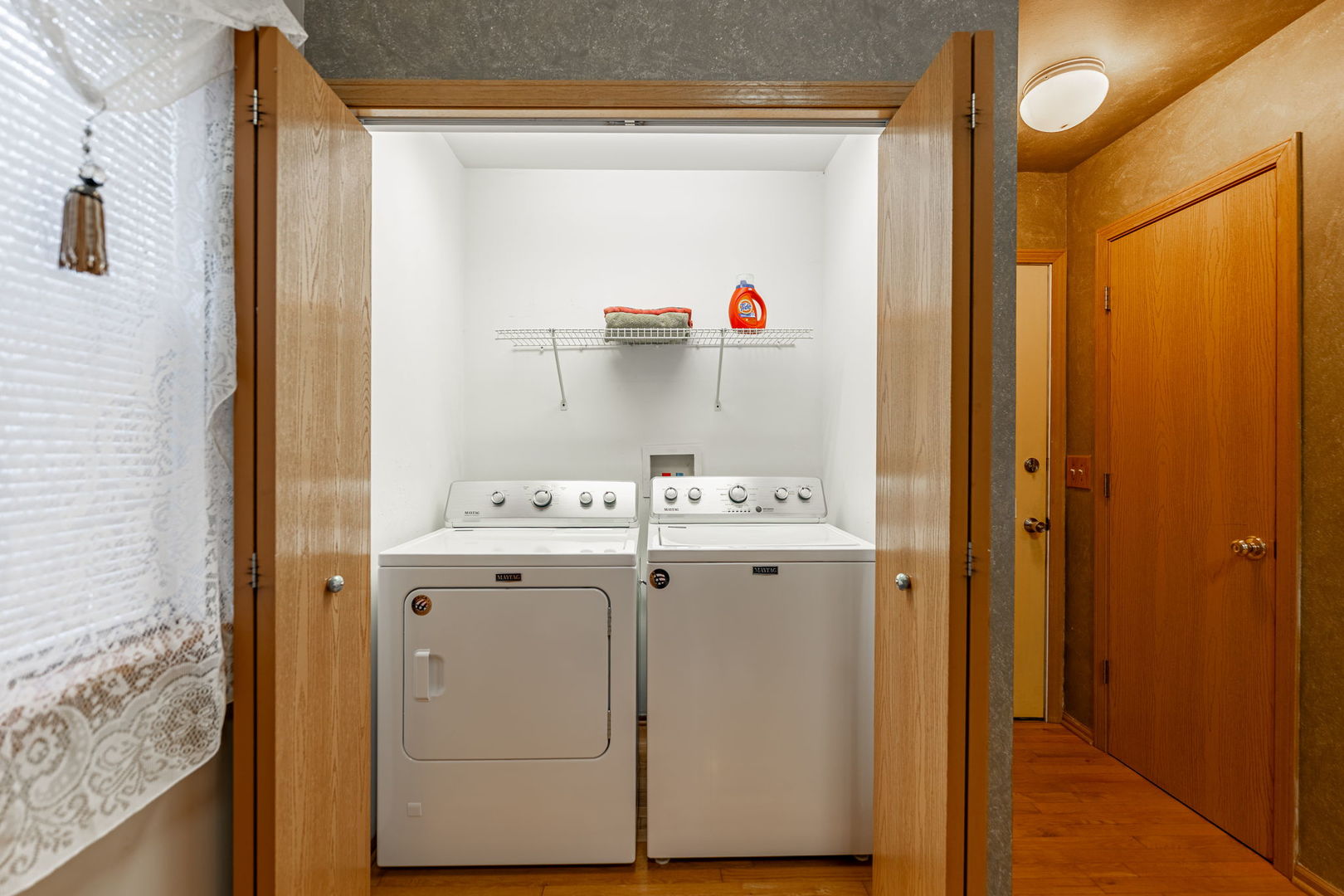 109 Shawnee Lane Harvard, IL 60033 - Photo 9 of 34 a view of utility room with washer and dryer