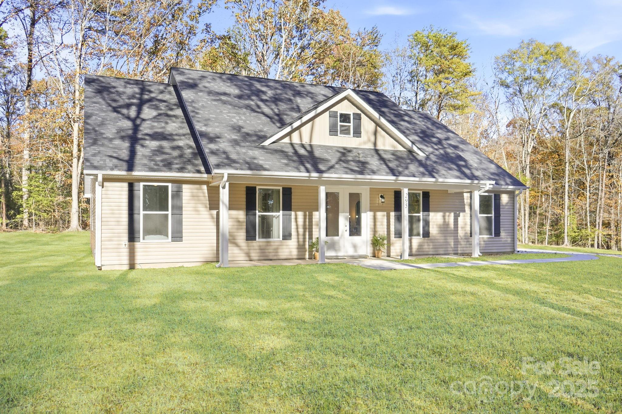 295 Mainsail Road Salisbury, NC 28146 - Photo 2 of 42 a front view of a house with a garden