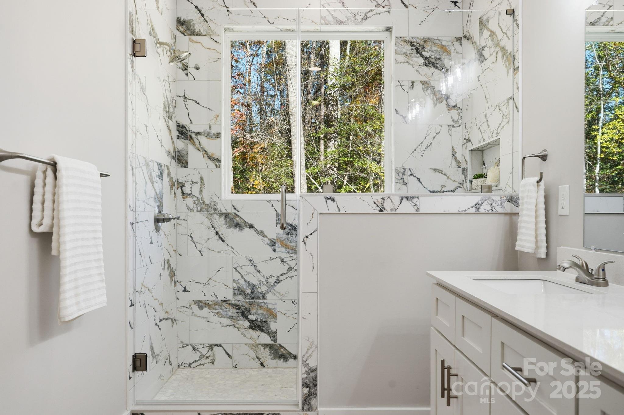 295 Mainsail Road Salisbury, NC 28146 - Photo 27 of 42 a bathroom with a sink and a mirror