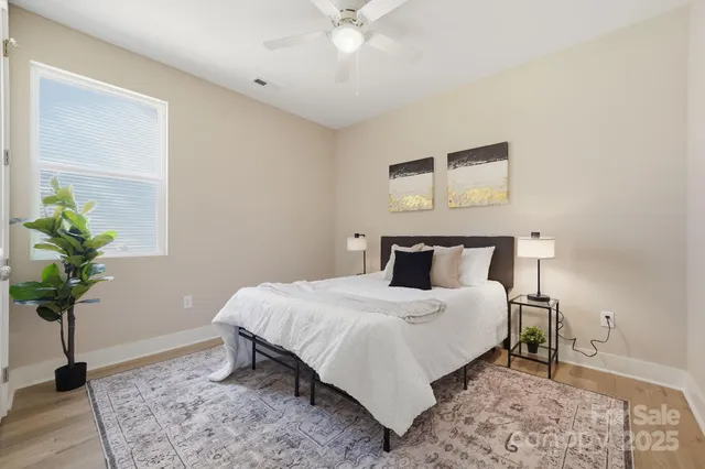 a bathroom with a sink vanity and toilet