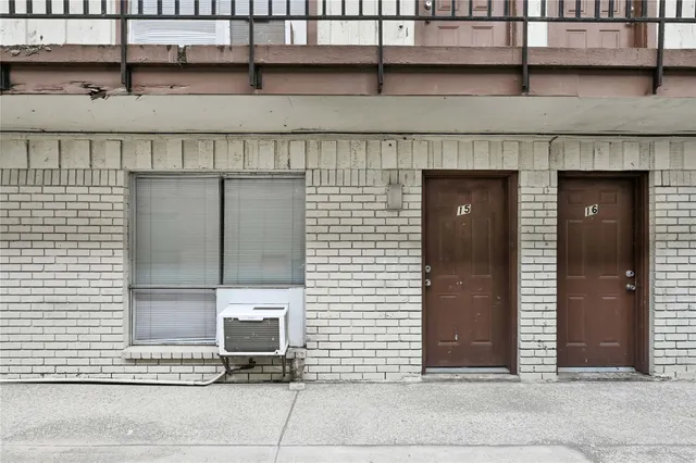 a front view of a house with parking