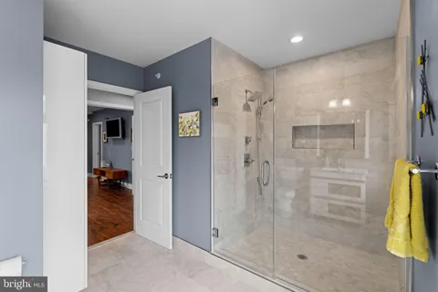 a room with furniture and stairs