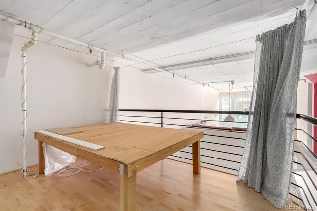 a kitchen with a table and chairs