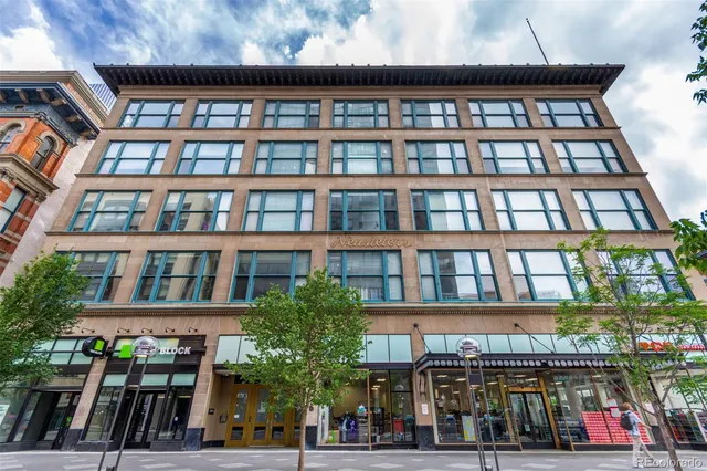 a front view of building with street