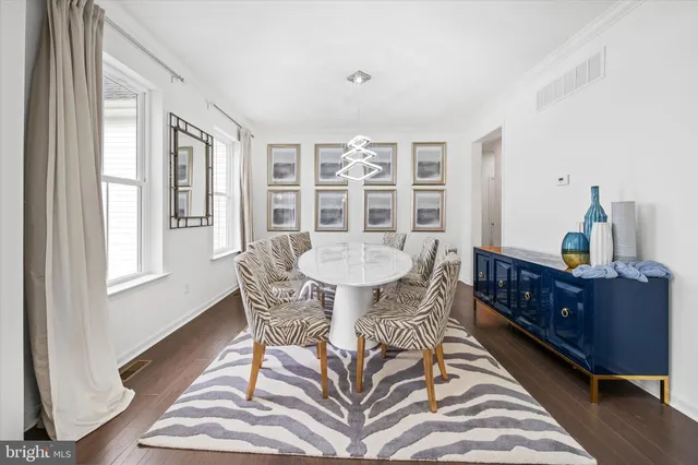 a living room with furniture fireplace and a flat screen tv
