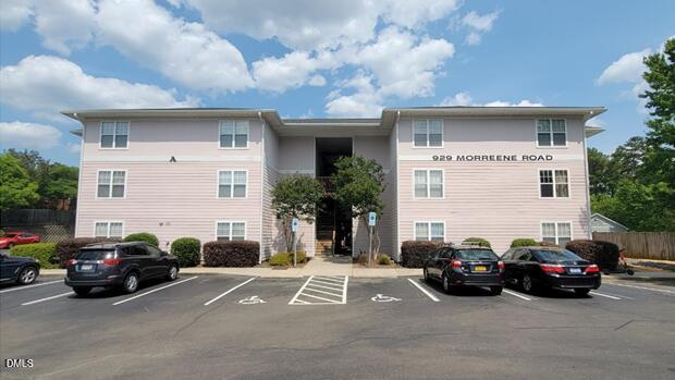 a car parked in front of a house