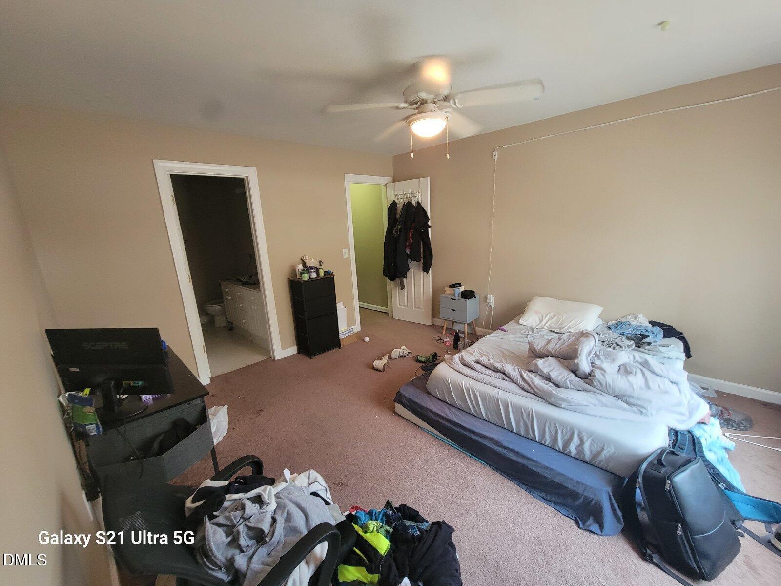 929 Morreene Road, Unit B26 Durham, NC 27705 - Photo 4 of 6 a bedroom with bed and a window