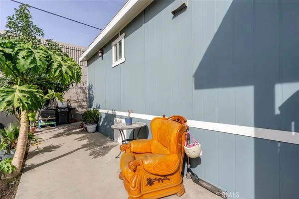 a backyard of a house with seating space
