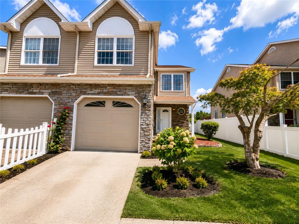 511 Howertown Road Northampton, PA 18067 - Photo 34 of 34 A well-kept front yard and inviting exterior with stone and siding accents welcome you home.