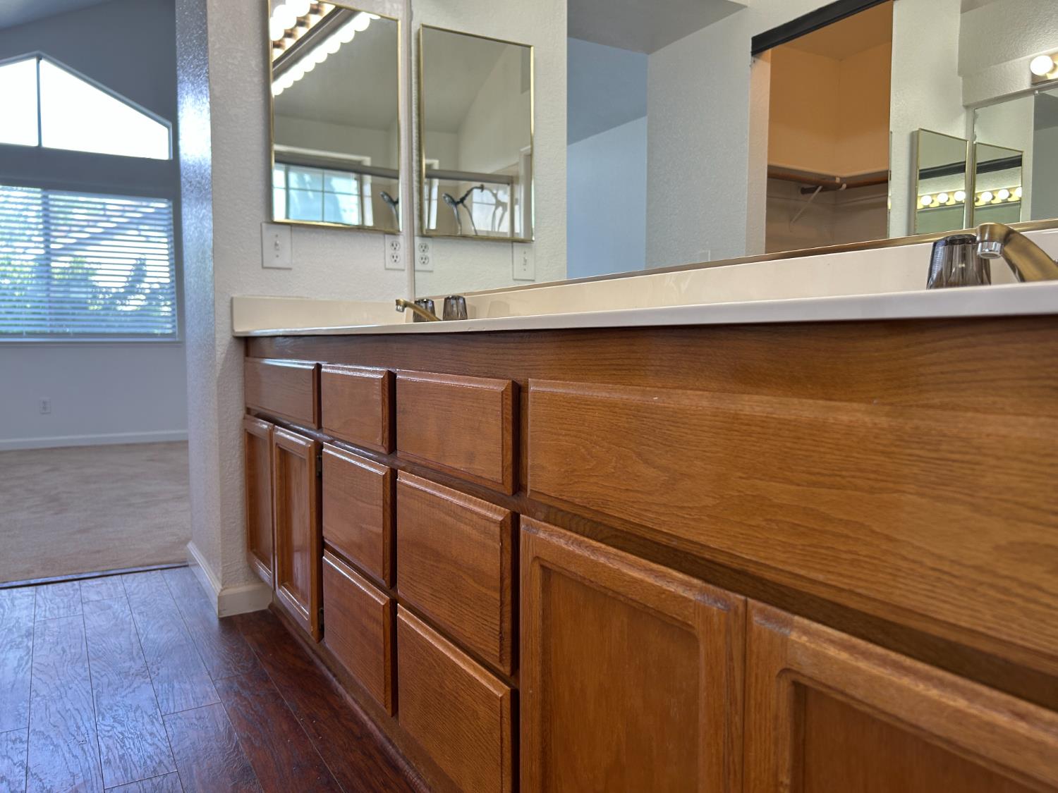1981 West Kavanagh Avenue Tracy, CA 95376 - Photo 14 of 21 a view of a kitchen with kitchen island a sink wooden floor and a window