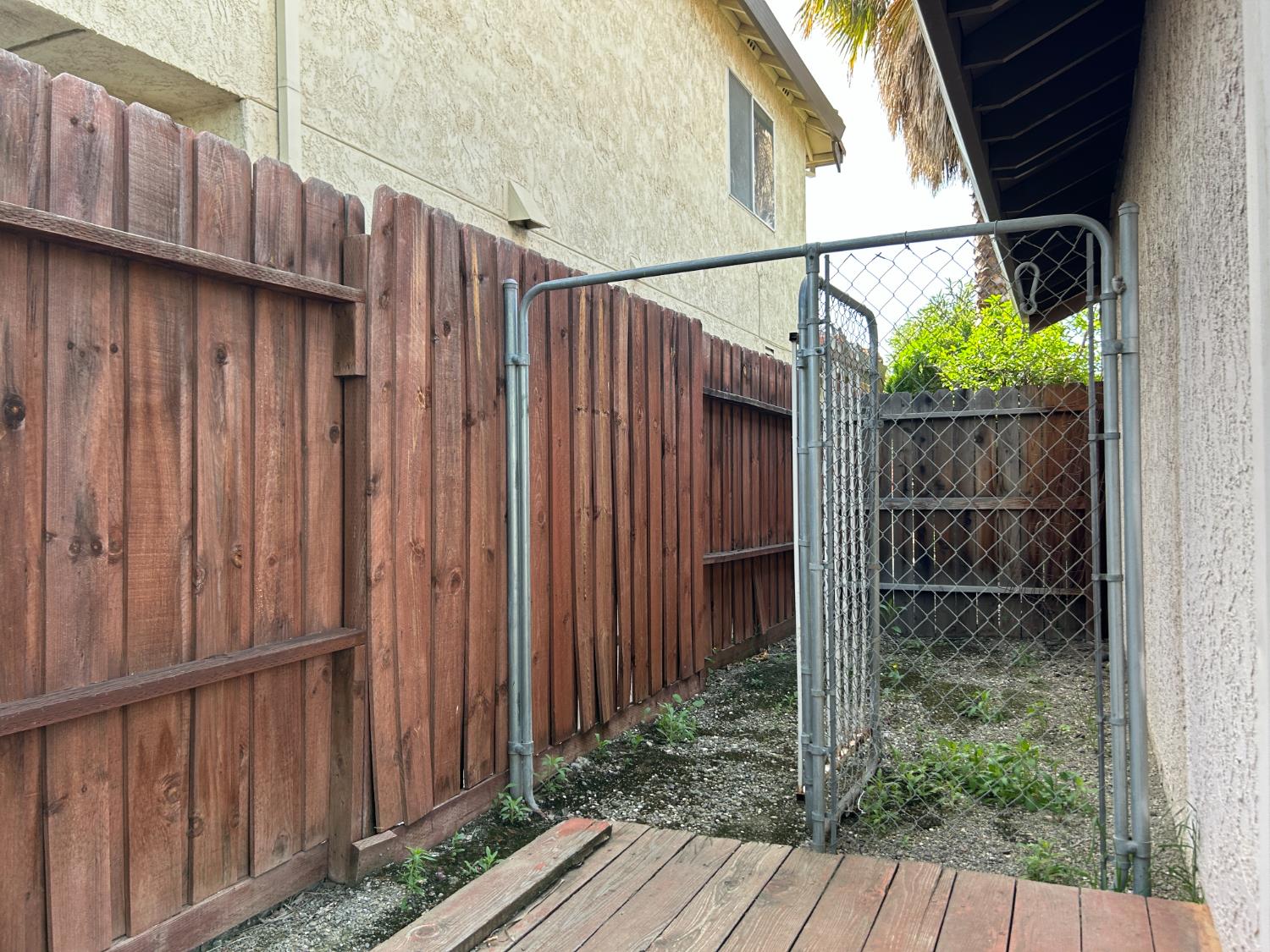 1981 West Kavanagh Avenue Tracy, CA 95376 - Photo 20 of 21 a view of a wooden fence