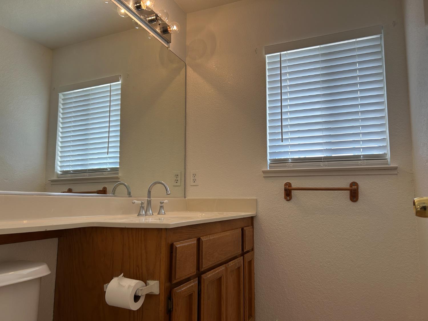 1981 West Kavanagh Avenue Tracy, CA 95376 - Photo 6 of 21 a bathroom with a sink and a mirror