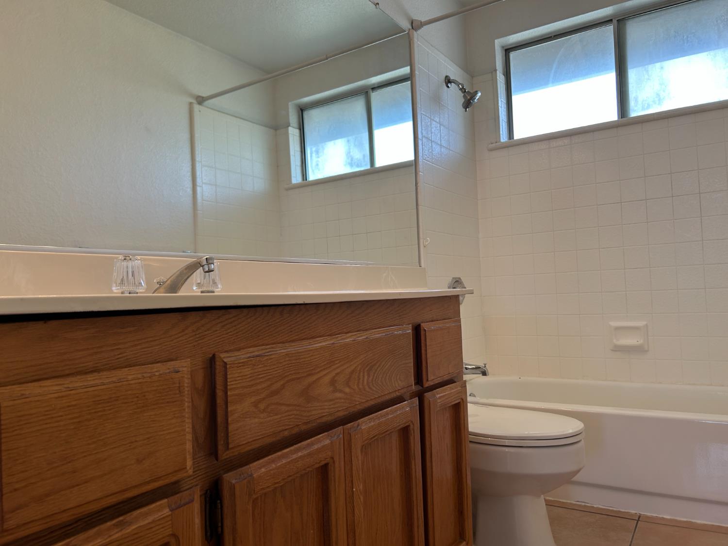 1981 West Kavanagh Avenue Tracy, CA 95376 - Photo 10 of 21 a bathroom with a sink a toilet and shower